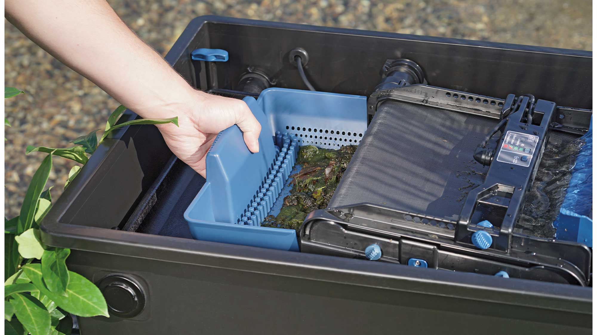 The Oase Biotec ScreenMatic 40000 pond filter combines foam biological media and an automated belt screen to remove solid waste.