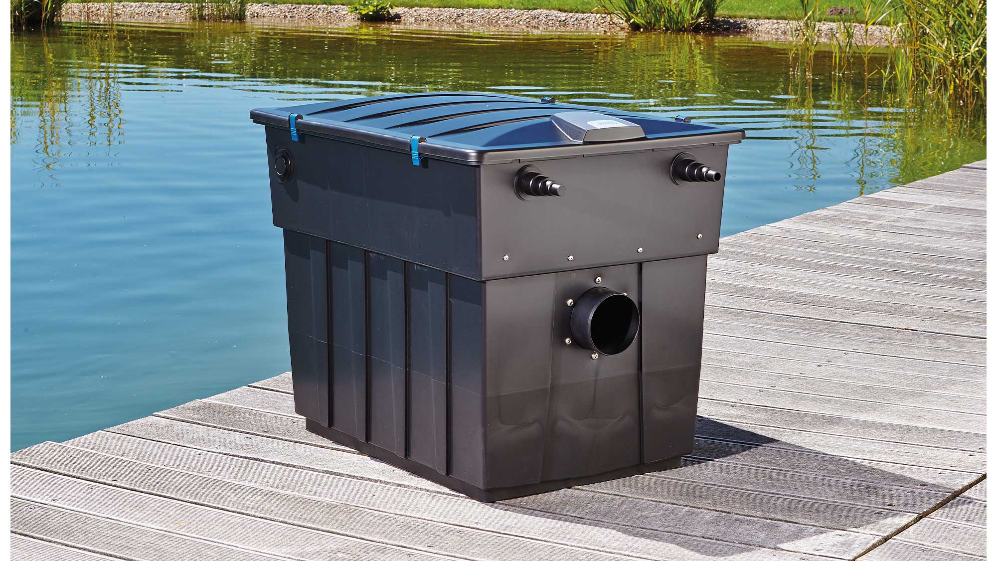 OASE105777-BioScreenmatic2 The Oase Biotec ScreenMatic 60000 pond filter combines foam biological media and an automated belt screen to remove solid waste.